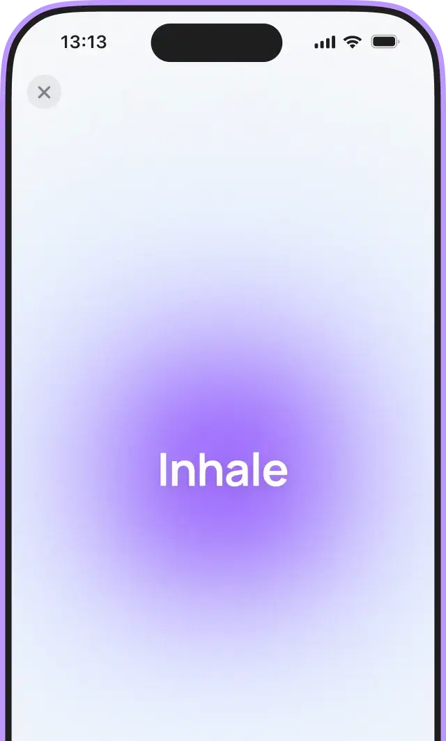 Smartphone displaying a breathing technique screen with the text 'Inhale', aimed at reducing emotional tension